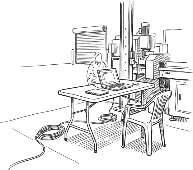 Ink drawing of a folding table set up on a factory floor with an open laptop and a notebook, a cable running away across the floor, and someone seated turned toward the machinery rather than the screen.